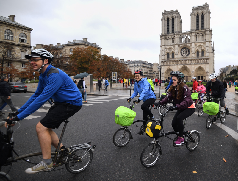Cyclists ride past Notre Dame Cathedral during a ‘car free’ day in Paris on October 1, 2017. ERIC FEFERBERG/AFP/Getty Images